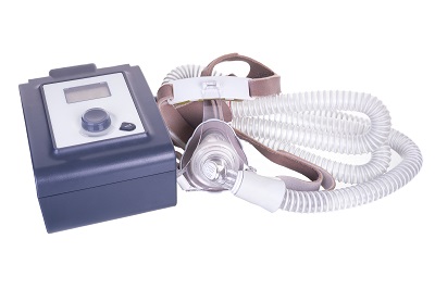 CPAP machine with tubing and mask